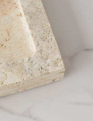 Close up view of the Teo catchall square tray in travertine