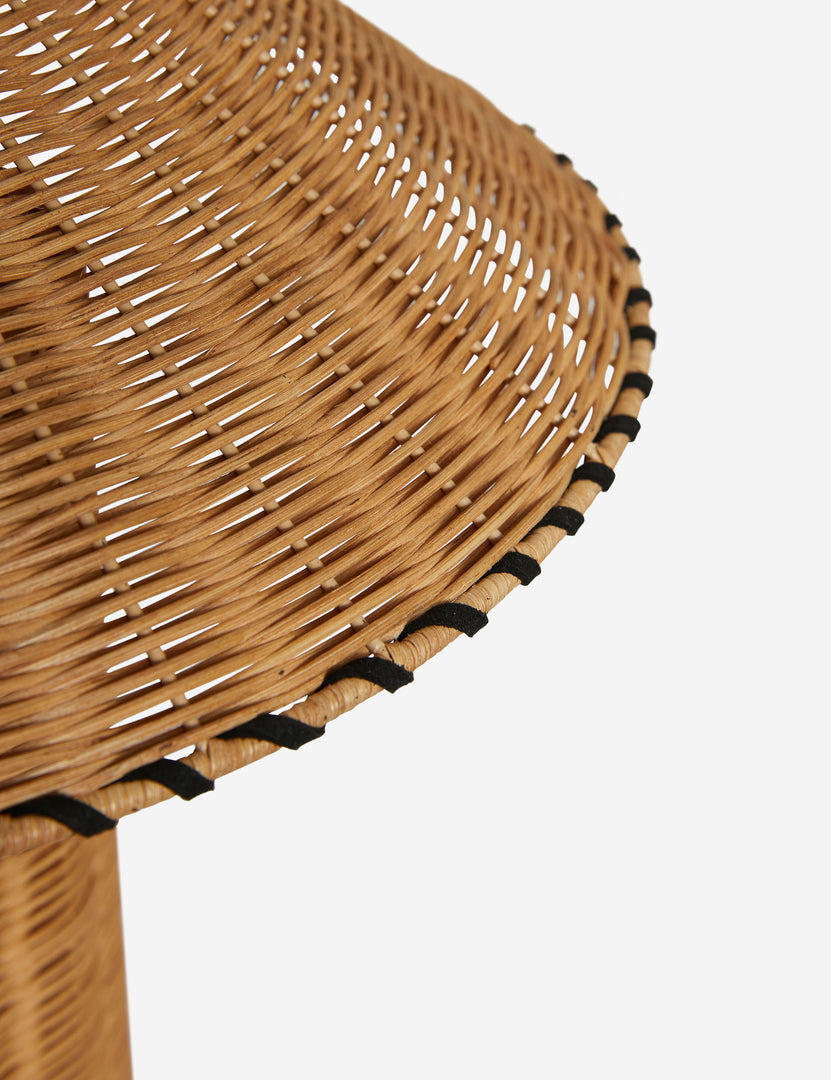 #color::natural | Close up of the shade of the Terrene Woven Rattan Table Lamp by Elan Byrd.