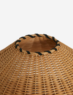 Close up of the Terrene Woven Rattan Table Lamp by Elan Byrd.