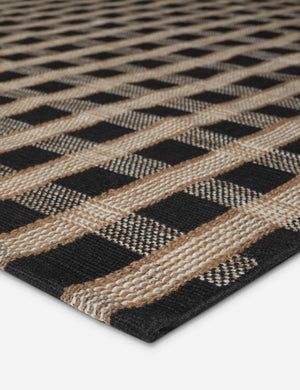 Close up of the Thatcher handwoven basketweave motif outdoor rug by Sarah Sherman Samuel.