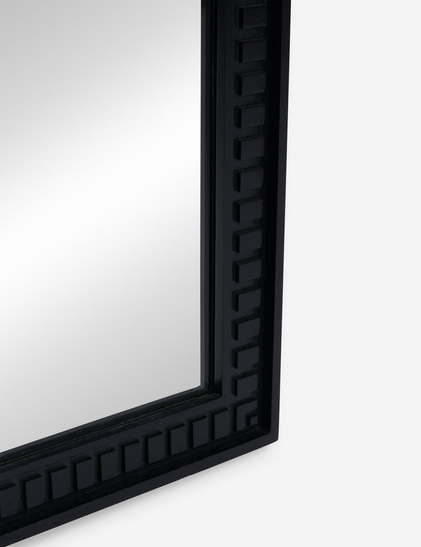 #color::black | Close up bottom corner view of the Thelma black carved wood framed mirror