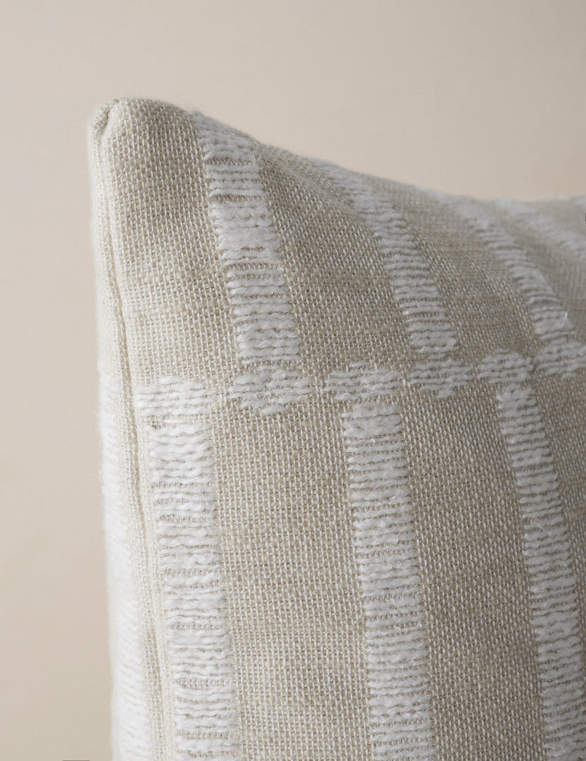 #color::ivory-and-natural #style::square #style::lumbar | Corner of the Thisbe offset stripe pillow.
