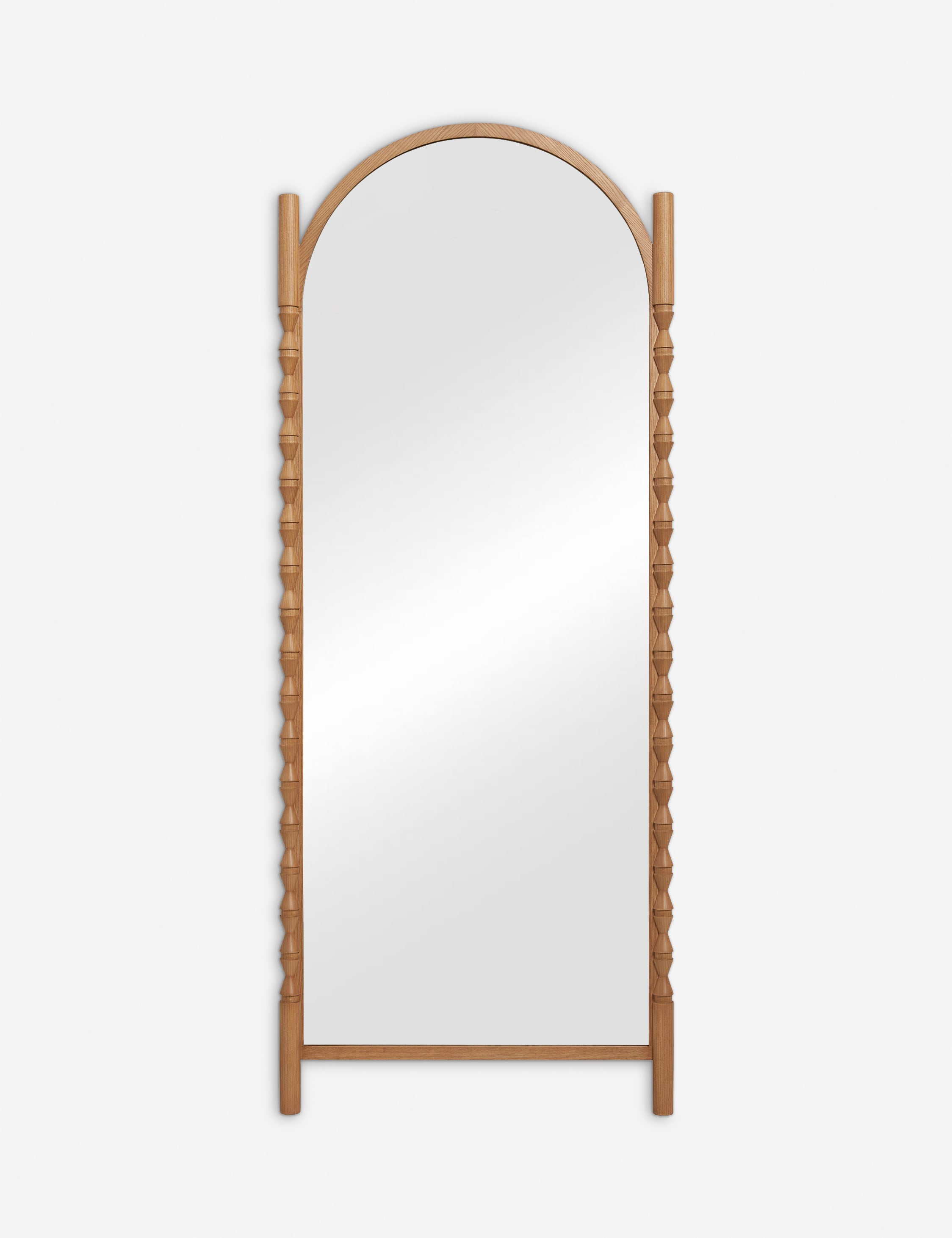 #color::natural | Topia arched carved wood frame floor mirror by Ginny Macdonald in natural.