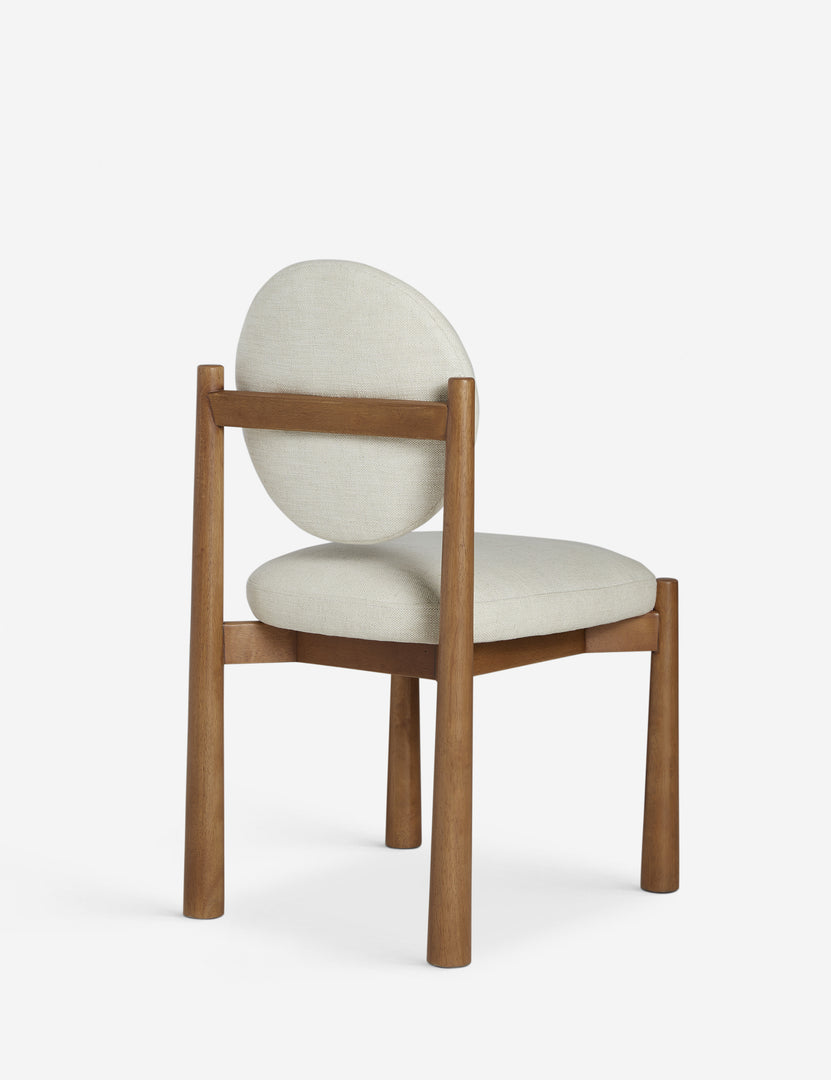 #color::ivory-basketweave | Angled back view of the Truett modern dining chair.