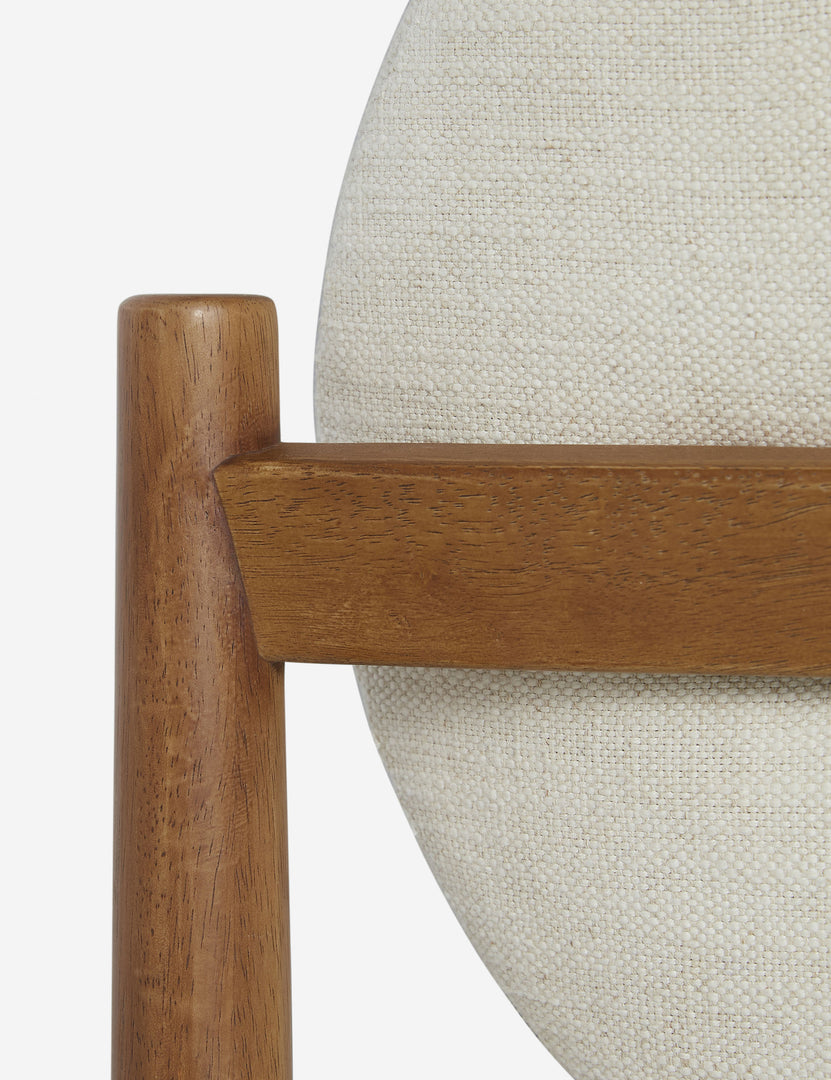 #color::ivory-basketweave | Close up of the frame of the Truett modern dining chair.