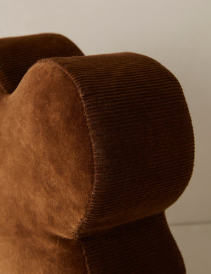 Close up view of the Velvet clover shaped accent pillow in cocoa