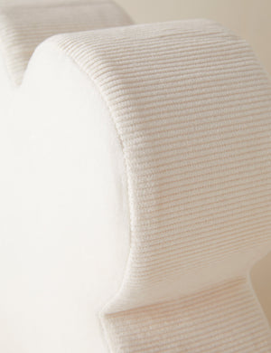 Close up view of the Velvet clover shaped accent pillow in ivory