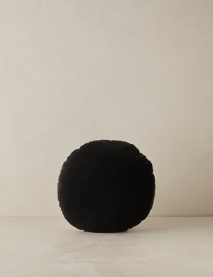 Velvet round accent pillow in black
