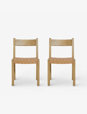 Set of 2 Vix light wood frame and woven leather seat dining chairs.