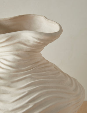 Close up of the Wrinkle sculptural, textured glazed vase in ivory