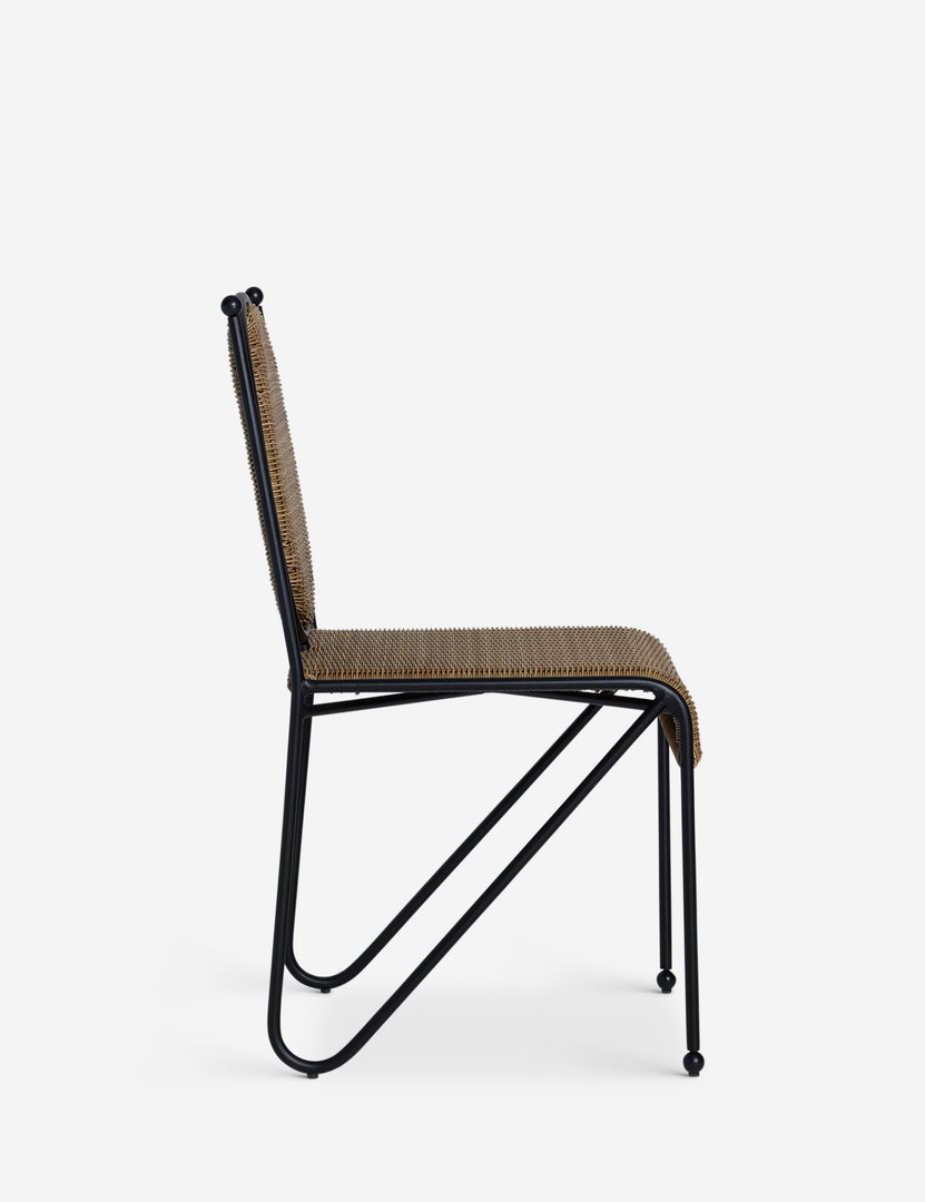 #color::natural | Side profile of the Ziggy modern wicker outdoor dining chair by Sarah Sherman Samuel.