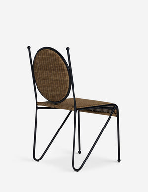 Angled back view of the Ziggy modern wicker outdoor dining chair by Sarah Sherman Samuel.