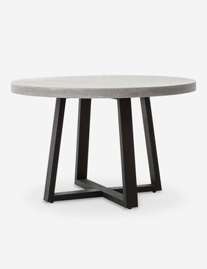 Agatha indoor and outdoor dining table with lavastone top and black iron base