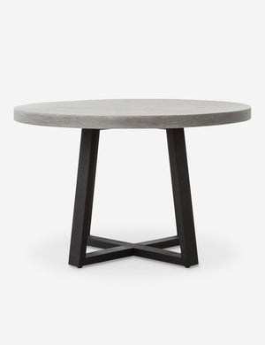 Agatha indoor and outdoor dining table with lavastone top and black iron base