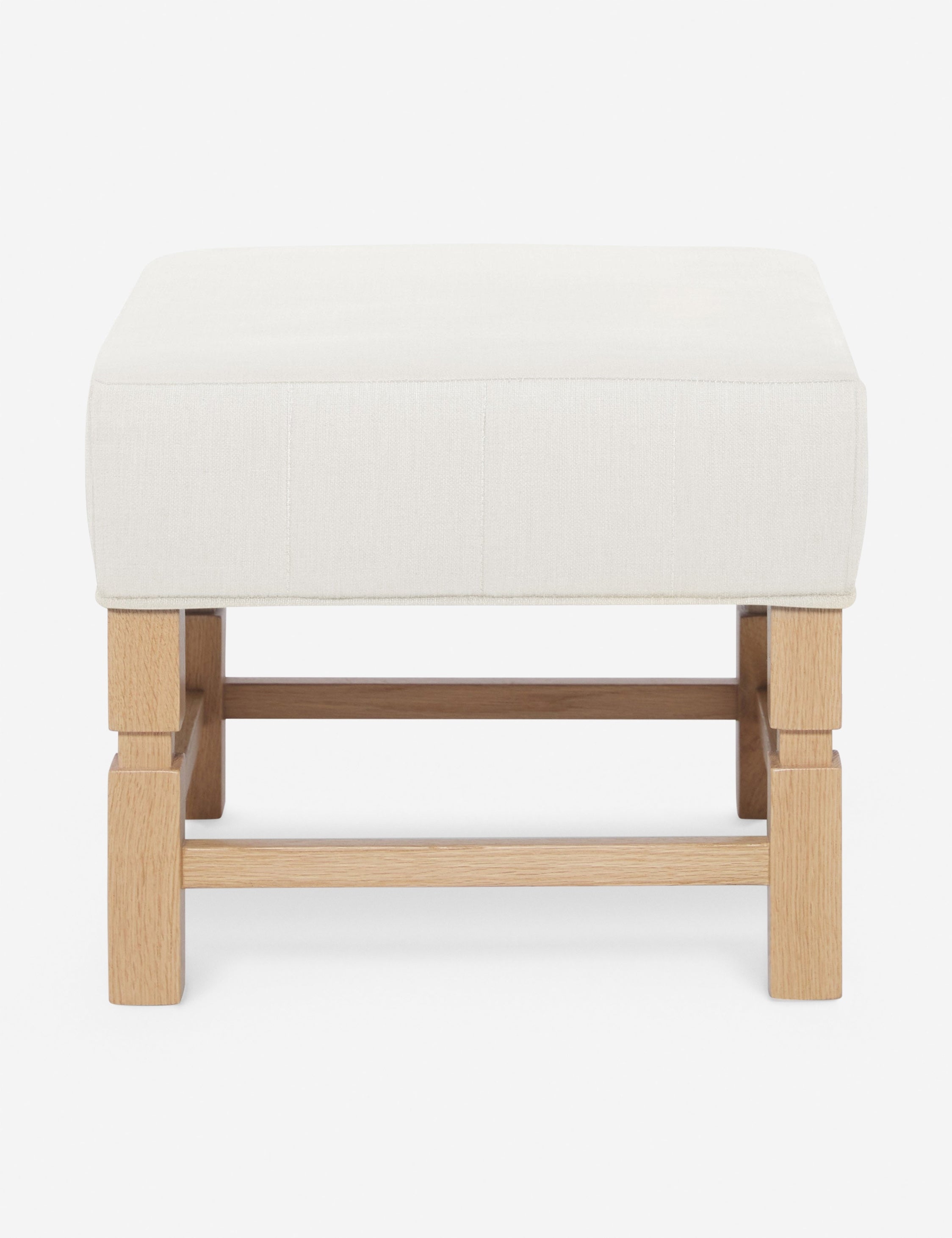 #color::oyster | Ambleside Oyster white upholstered ottoman by Ginny Macdonald with a carved frame and vertical channeling on the cushion