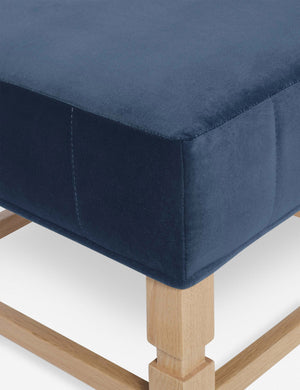 Close-up of the corner on the cushion of the Ambleside Harbor blue velvet ottoman
