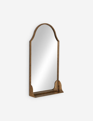 Angled view of the Clare arched wall mirror with shelf