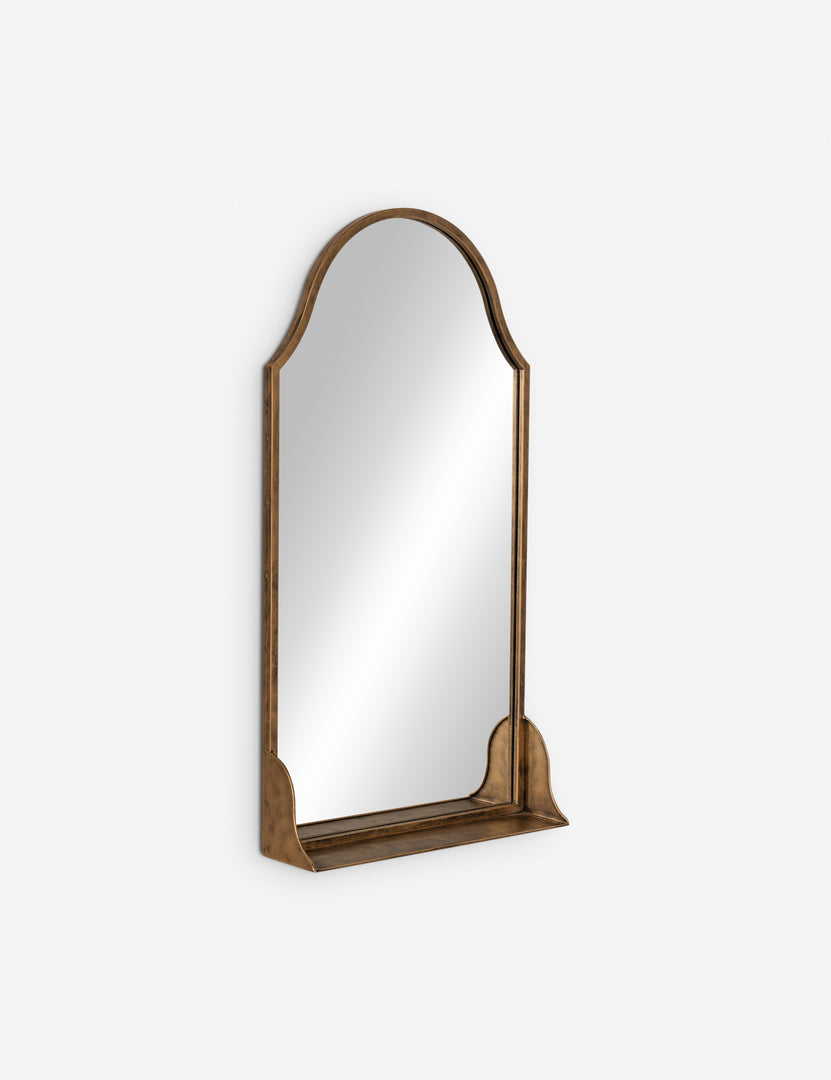 | Angled view of the Clare arched wall mirror with shelf