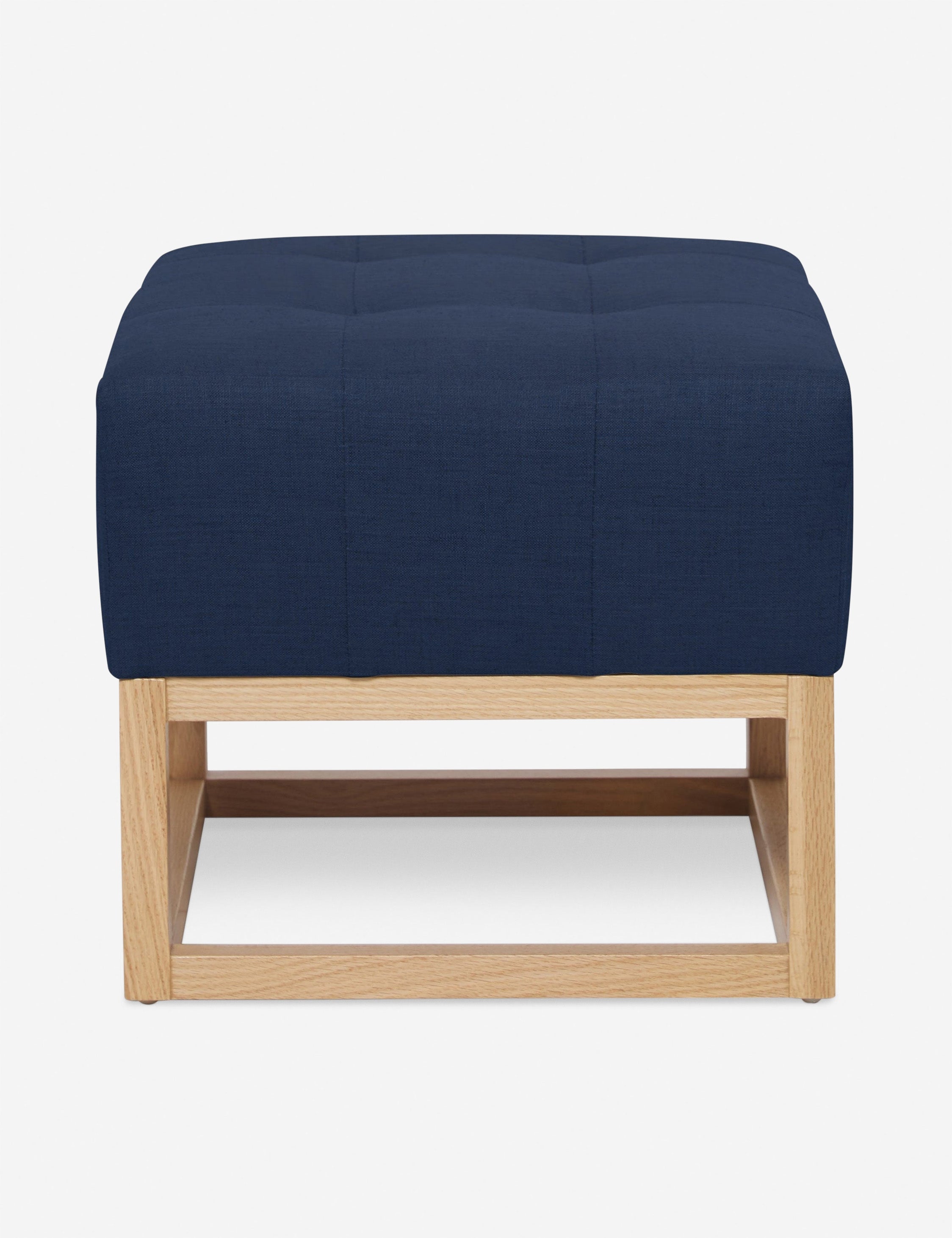#color::dark-blue | Dark Blue Linen Grasmere Ottoman with an upholstered cushion and airy wooden frame by Ginny Macdonald