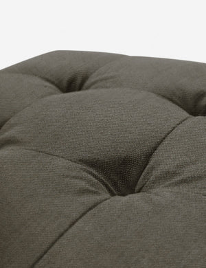 Button tufting on the cushion of the Loden Gray Linen Grasmere Ottoman