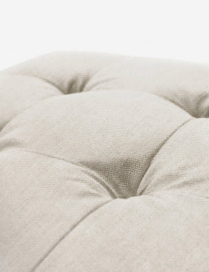 Button tufting on the cushion of the Natural Linen Grasmere Ottoman