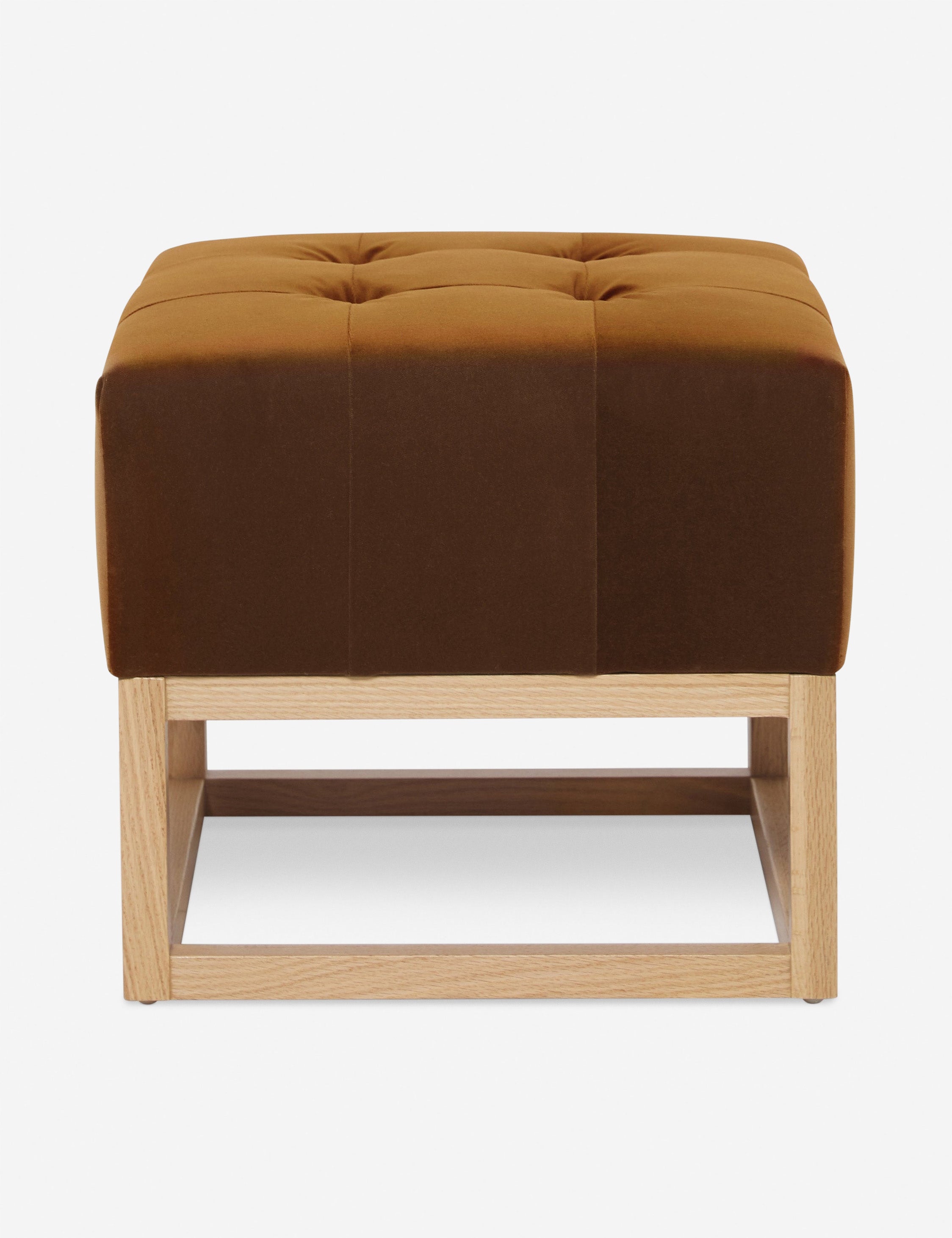 #color::cognac | Cognac Velvet Grasmere Ottoman with an upholstered cushion and airy wooden frame by Ginny Macdonald