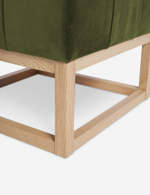 Close up of the airy wooden frame on the bottom of the Grasmere Jade Green Velvet Ottoman