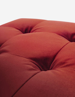 Button tufting on the cushion of the Paprika Velvet Grasmere Ottoman