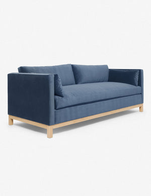 Angled view of the Harbor Blue Velvet Hollingworth Sofa