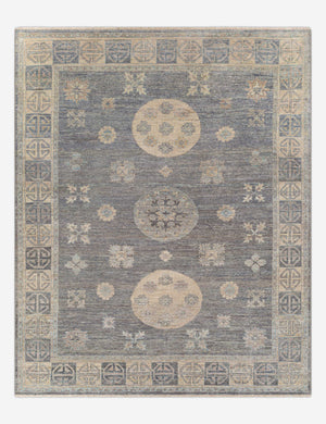 Aguirre traditional motif hand-knotted wool rug with subtle fringe