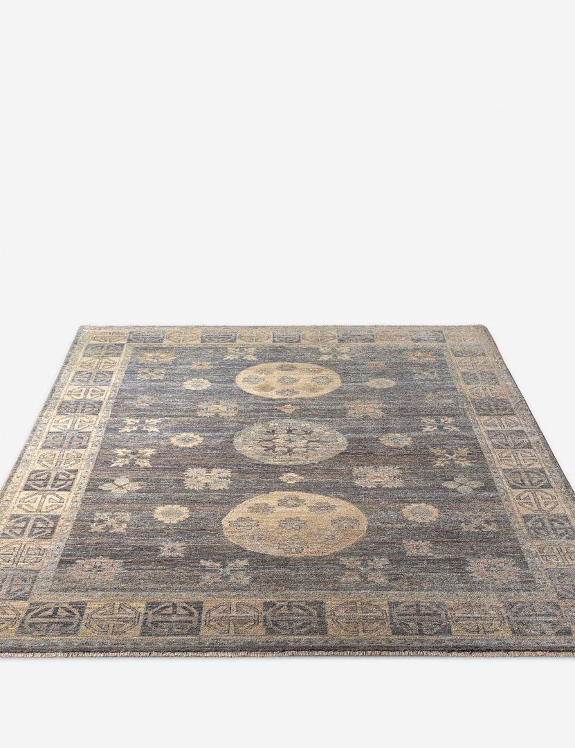 #size::2--x-3- #size::6--x-9- #size::9--x-12- #size::8--x-10- | Angled view of the Aguirre traditional motif hand-knotted wool rug with subtle fringe