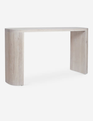 Angled view of the Luna white-washed oak oval console table.