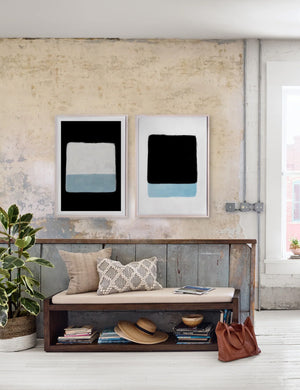 The marella bench sits in an industrial room with a dark sideboard, two wall arts, and a large window