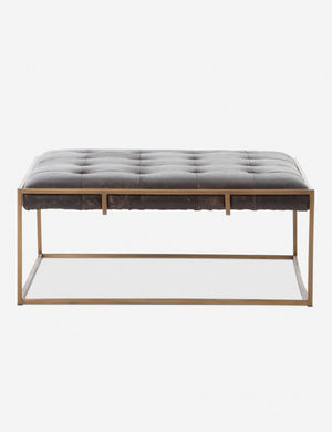 Olwina Square Black Leather Coffee Table with a tufted finish and a brass-tone metal frame