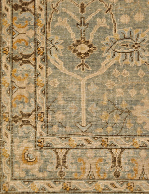 Close up of the Quintero traditional motif hand-knotted wool rug