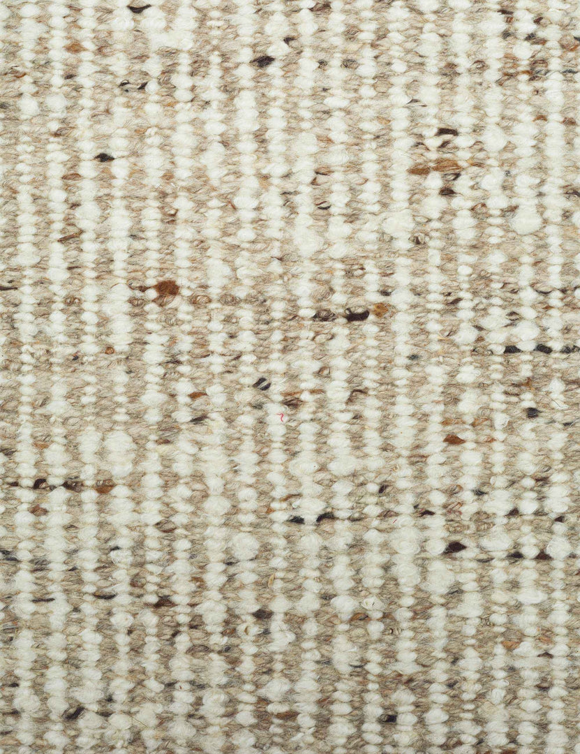 #color::neutral #size::10--x-14- #size::2-6--x-8- #size::6--x-9- #size::8--x-10- #size::9--x-12- | Close-up of the weave on the Taos neutral light brown wool blend area rug.