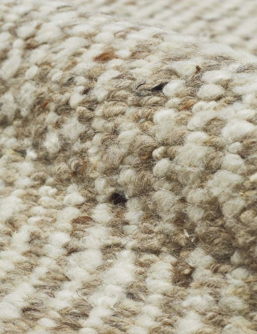 #color::neutral #size::10--x-14- #size::2-6--x-8- #size::6--x-9- #size::8--x-10- #size::9--x-12- | Close-up of the Taos neutral light brown wool blend area rug.
