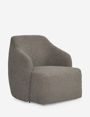 Angled view of the Tobi Gray Boucle swivel chair