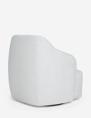 Angled rear view of the Tobi Natural linen swivel chair