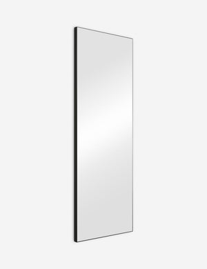 Angled view of the Shea rectangular black framed full length floor mirror