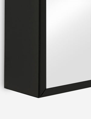 Close-up of the black frame on the Shea rectangular full length floor mirror
