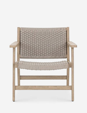 Ylva Natural Indoor / Outdoor Accent Chair featuring a braided seat and back and wooden frame