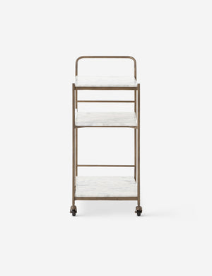 Side view of the Evander brass frame and white marble bar cart.