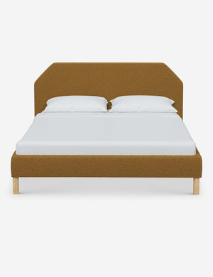 Kipp Ochre Boucle upholstered platform bed with a geometric headboard and pinewood legs
