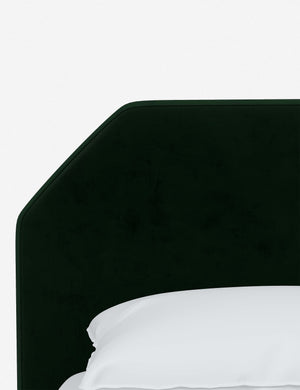 The geometric headboard on the Kipp Emerald Green Velvet platform bed