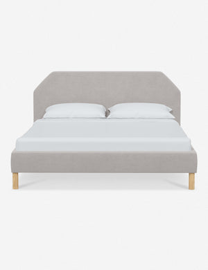Kipp Mineral Gray Velvet upholstered platform bed with a geometric headboard and pinewood legs