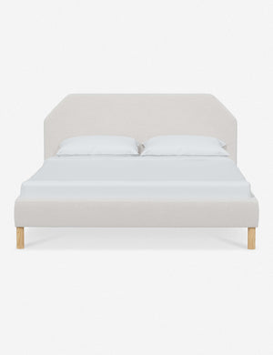 Kipp Snow White Velvet upholstered platform bed with a geometric headboard and pinewood legs