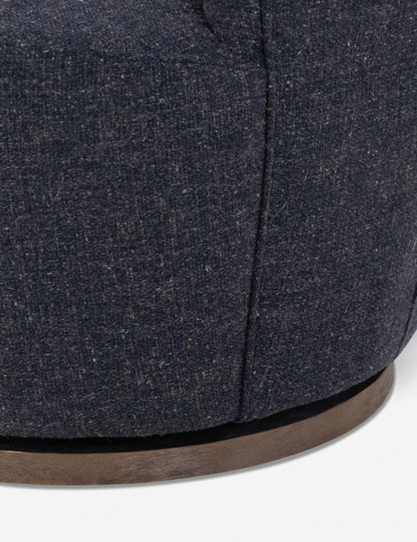 #color::slate | Close-up of the swivel base and fabric for the Margie rounded barrel swivel accent chair in slate