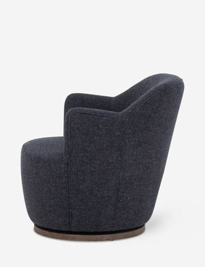 Side view of Margie rounded barrel swivel accent chair in slate