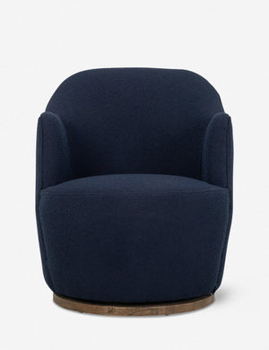 Margie rounded barrel swivel accent chair in navy